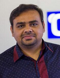 Headshot of Faheem Abbas in a business suit.