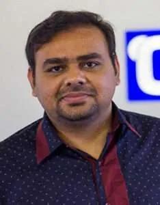 Headshot of Faheem Abbas in a business suit.