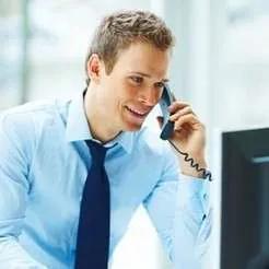 Businessman smiling – corporate career or success image