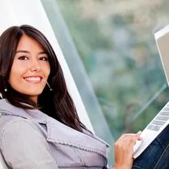 Professional student studying with laptop, focused on learning