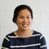 Portrait of Viv Luu smiling in a casual setting