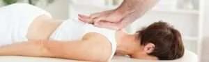 Student practicing massage therapy techniques – health and wellness course